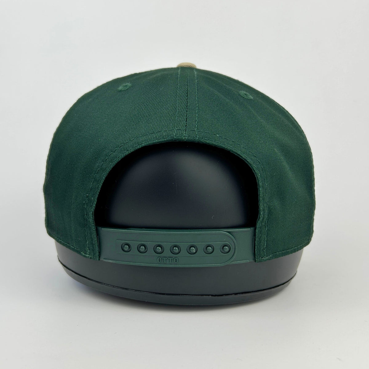 Green cap with black interior on a white background