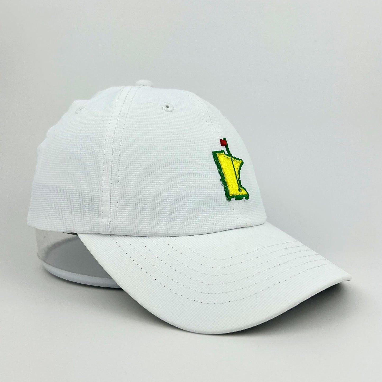 White Minnesota Masters cap on a light gray background