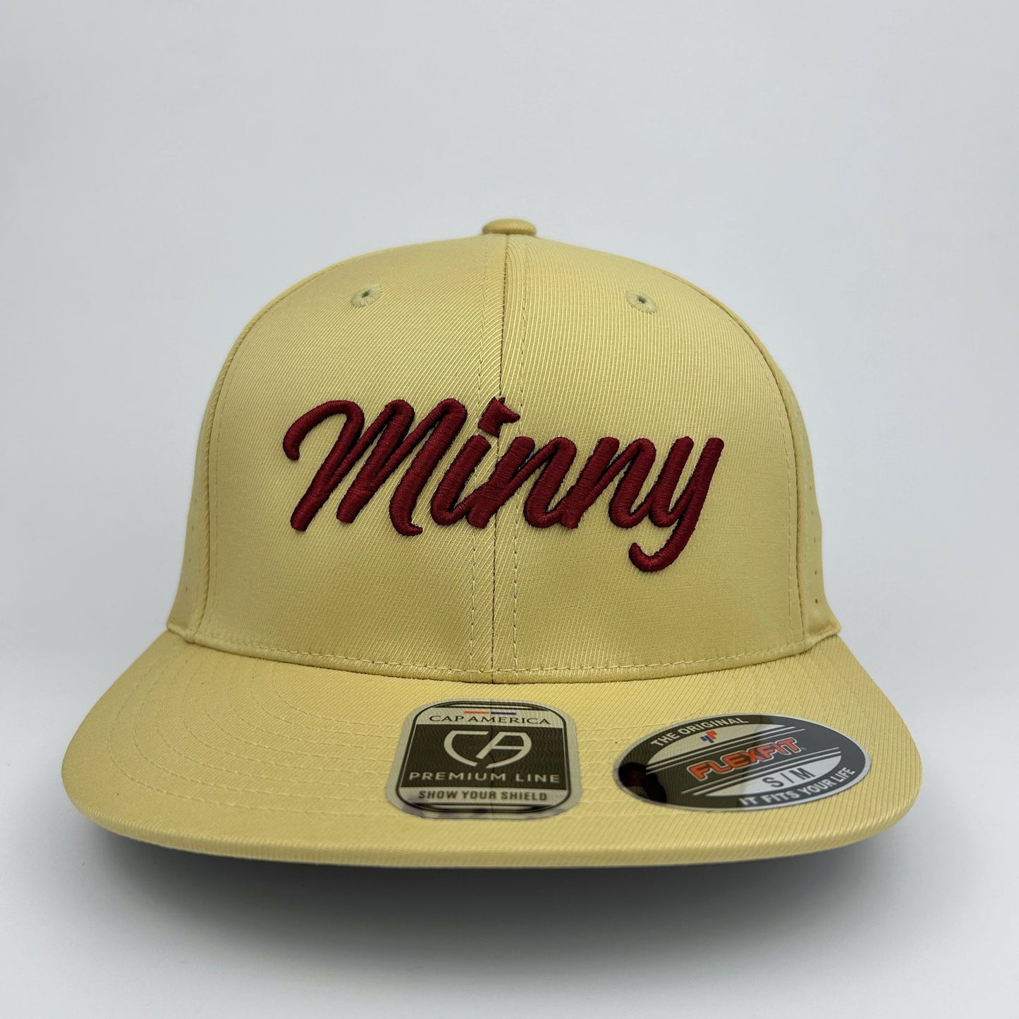 Beige cap with 'Minny' in red text on a white background
