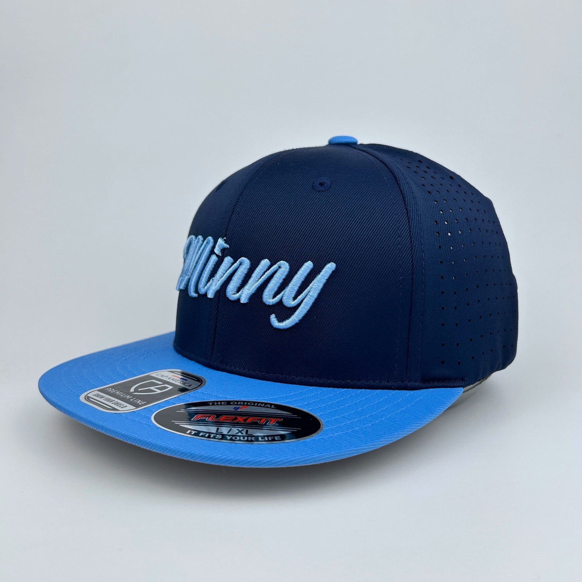 Navy and blue cap with 'Minny' branding on a light gray background