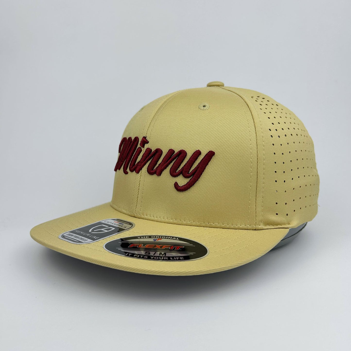 Beige cap with red text on a gray background