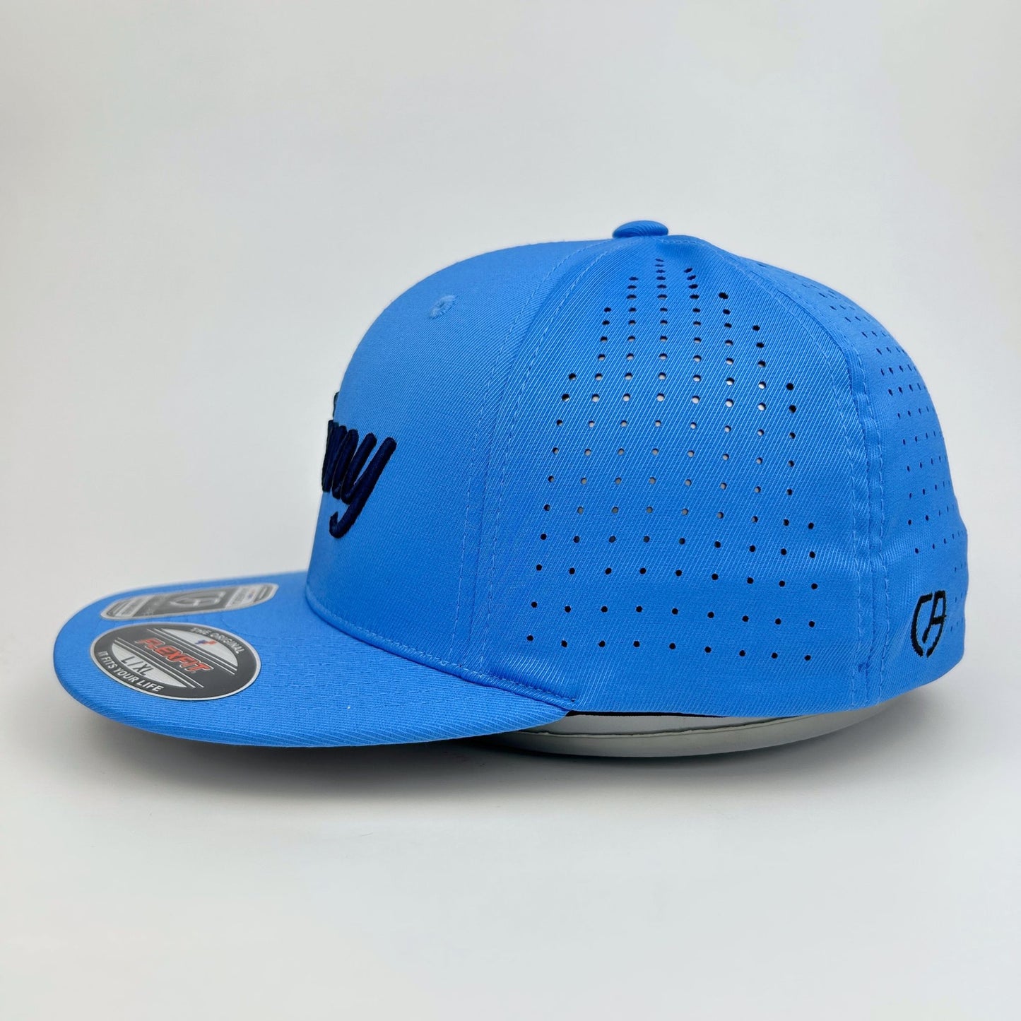 Blue baseball cap with perforated design on a light gray background