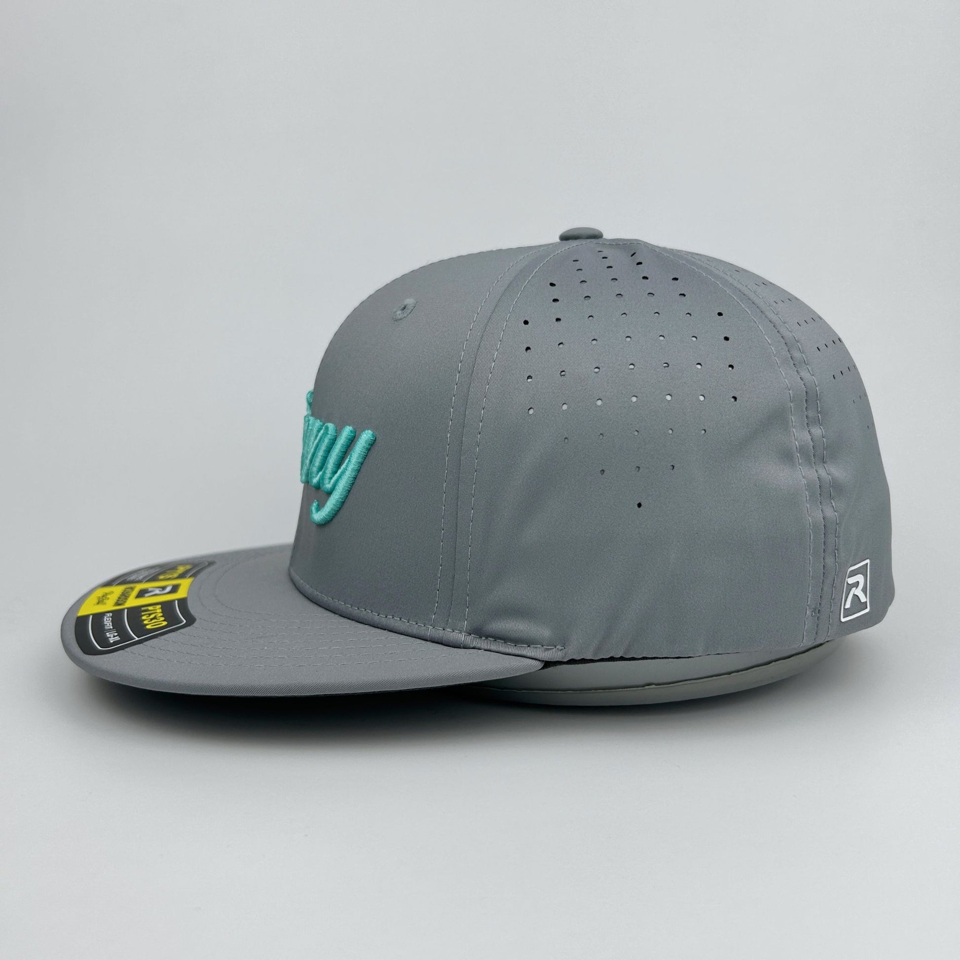 Gray cap with a brand logo on a light gray background