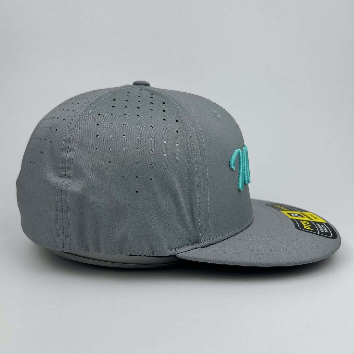 Gray cap with a logo on a light gray background
