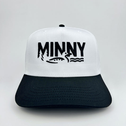 White and black cap with 'MINNY' logo on a light gray background